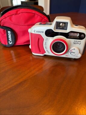 vintage 90s Canon Sure Shot WP-1 Film Camera in White and Red with Red Case